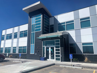 Modern office building with Charcoal MetroStone on the exterior