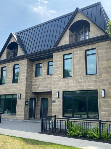 Modern building with rustic sandstone 